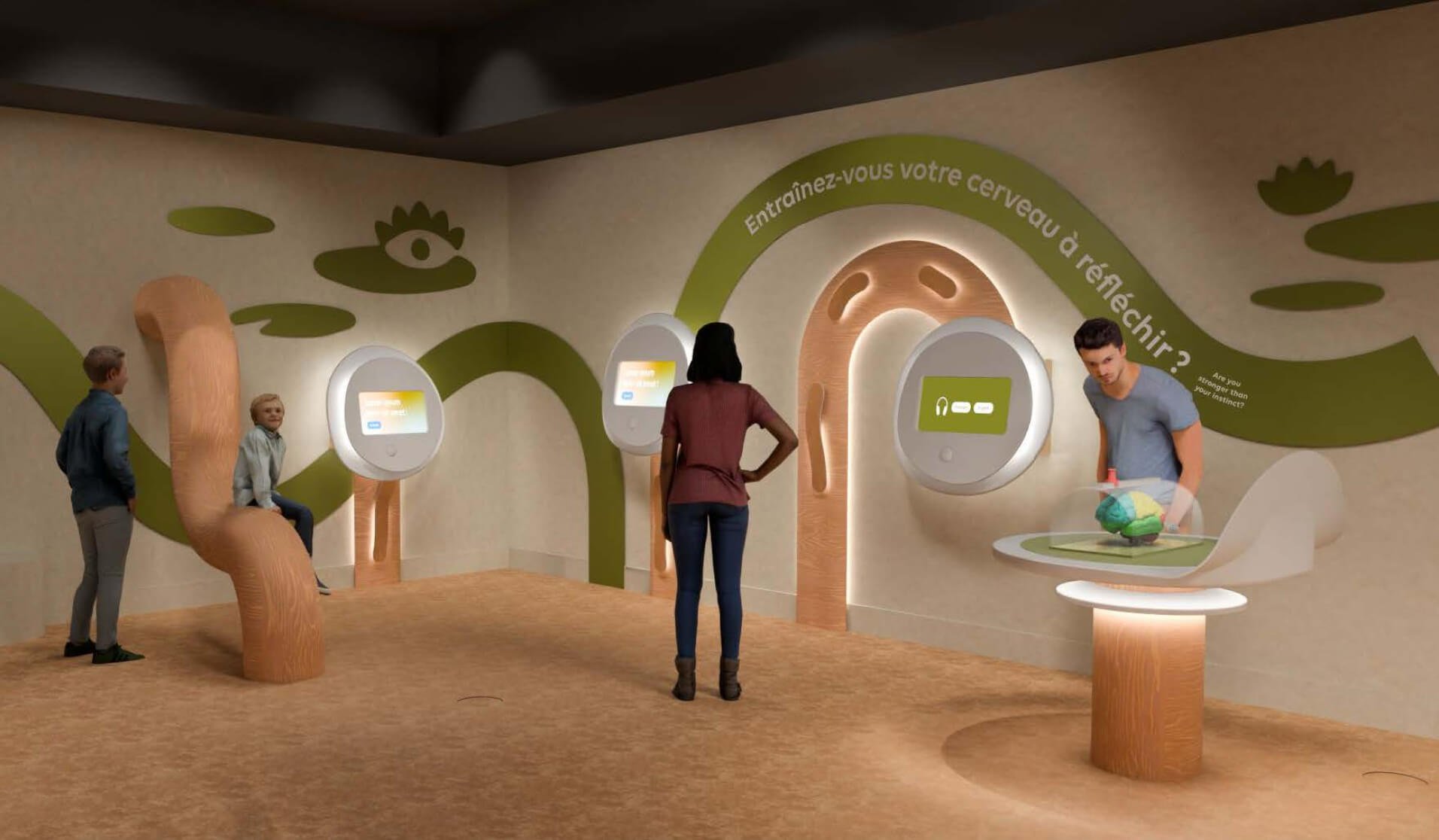 Personnes dans une salle d'exposition interactive avec écrans et racines géantes.